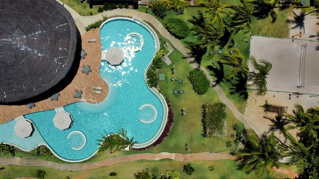 Piscina e área de lazer do Condomínio Naluum